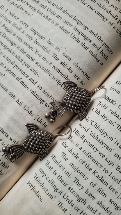 Side view of Rayini Earrings in pure silver with handcrafted detailing