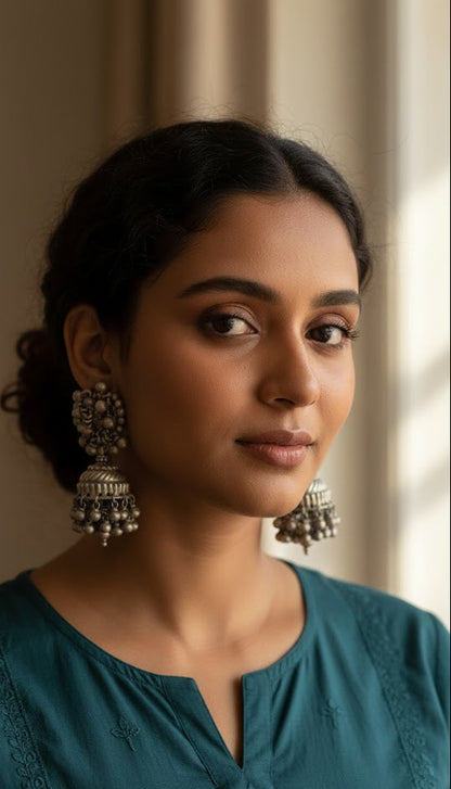 Side view of Rimjhim Vintage Jhumka in pure silver with vintage detailing