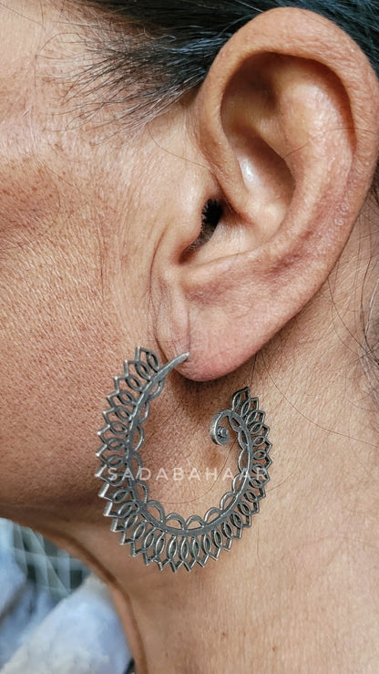 Side view of Roop Earrings in pure silver with handcrafted detailing