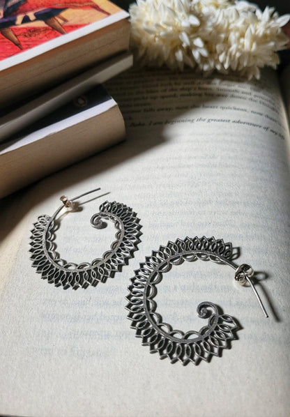 Side view of Roop Earrings in pure silver with handcrafted detailing