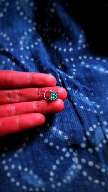 Side view of Ruchika Nose-Pin in pure silver with handcrafted detailing