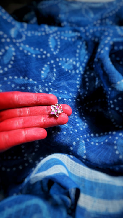 Side view of Saarang Nose-Pin in pure silver with handcrafted detailing
