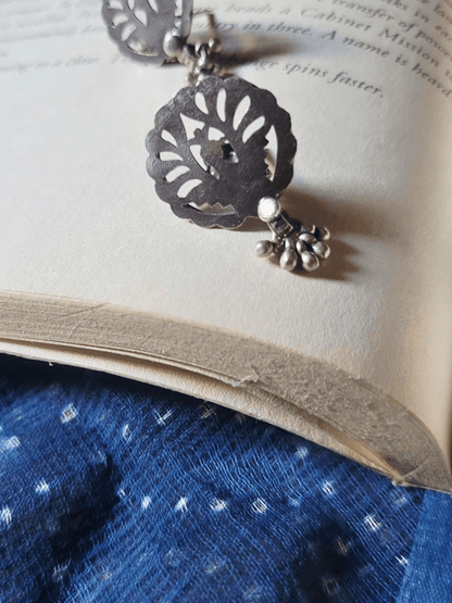 Side view of Saavani Studs in pure silver with handcrafted detailing