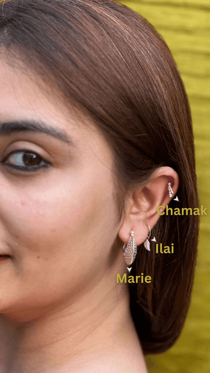 Side view of Chamak Hoops in pure silver with handcrafted detailing