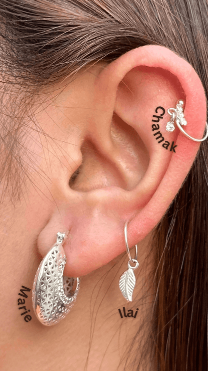 Side view of Ilai Hoops in pure silver with handcrafted detailing