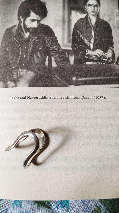 Side view of Sadabahaar Vanki Ring in pure silver with handcrafted detailing