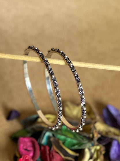 Side view of Sajja Bangles in pure silver with handcrafted detailing
