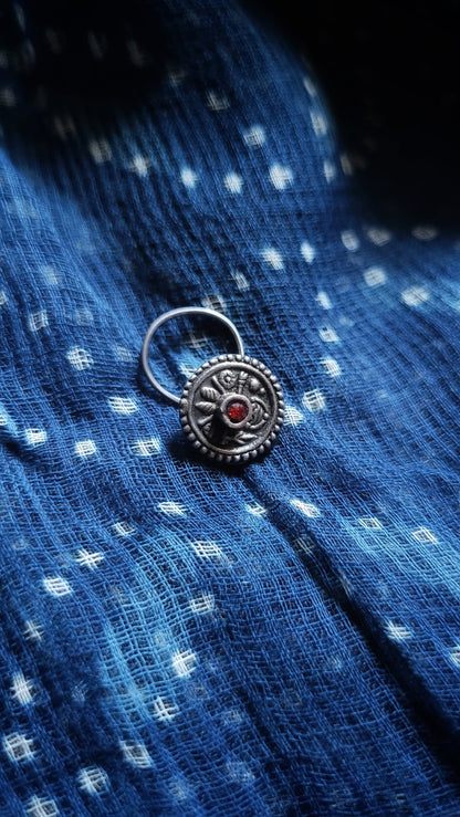 Side view of Sarisha Nose-Pin in pure silver with handcrafted detailing