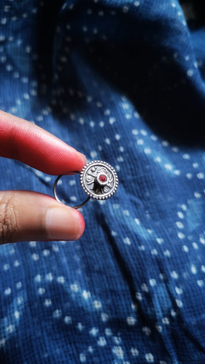 Side view of Sarisha Nose-Pin in pure silver with handcrafted detailing