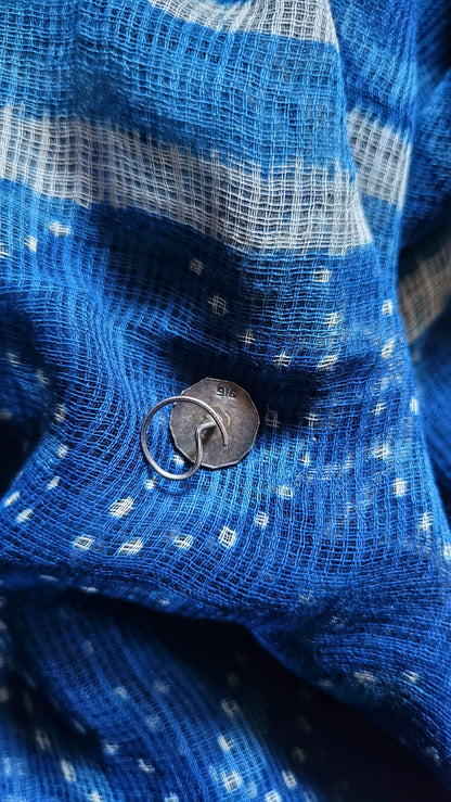 Side view of Sarisha Nose-Pin in pure silver with handcrafted detailing