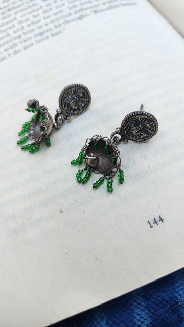 Sadabahaar Jewelry Authentic Vintage Silver Jhumka with Deity Embossed Studs, Green Beads and Central Ghungroo for Women - side view