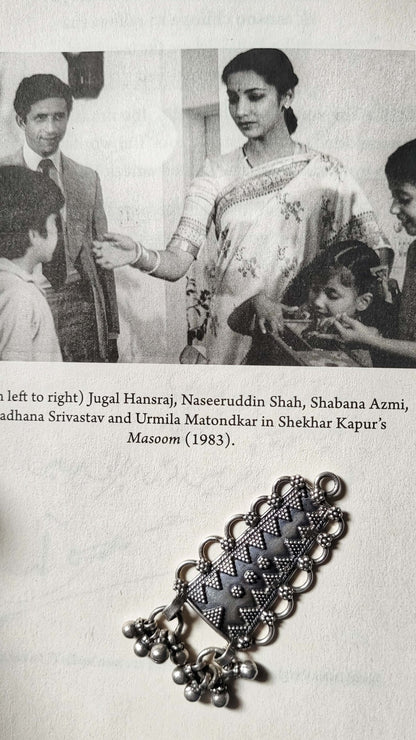 Side view of Shikhar Pendant in pure silver with handcrafted detailing
