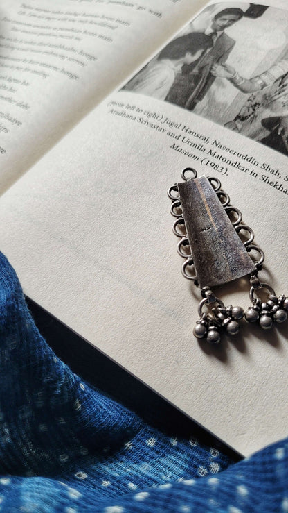 Side view of Shikhar Pendant in pure silver with handcrafted detailing