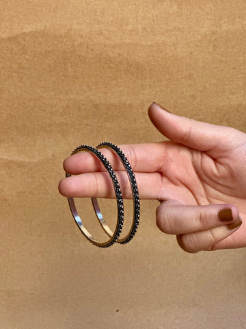 Shobha Bangles in pure silver with handcrafted detailing