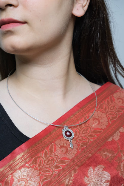 Side view of Sindoori Hasli Necklace in pure silver with handcrafted detailing