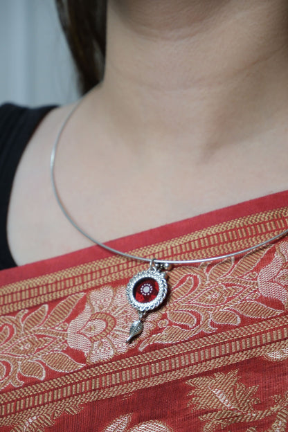Side view of Sindoori Hasli Necklace in pure silver with handcrafted detailing