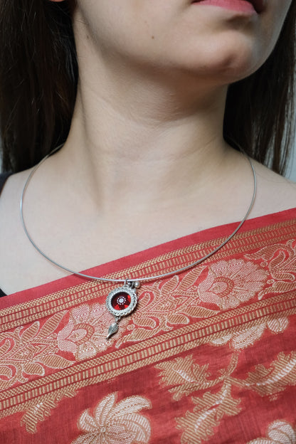 Side view of Sindoori Hasli Necklace in pure silver with handcrafted detailing
