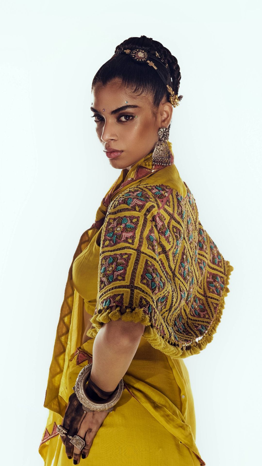 Side view of Himadri Earrings in pure silver with handcrafted detailing