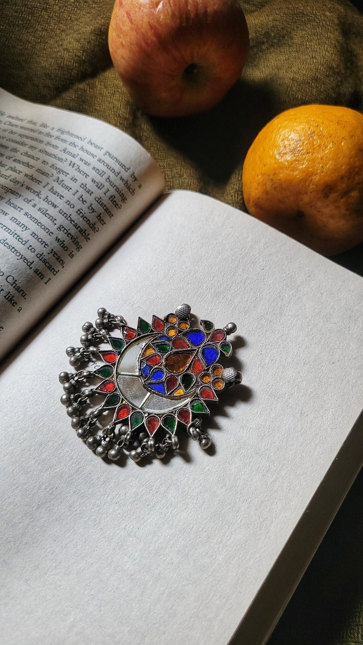 Side view of Surmaya Pendant in pure silver with handcrafted detailing