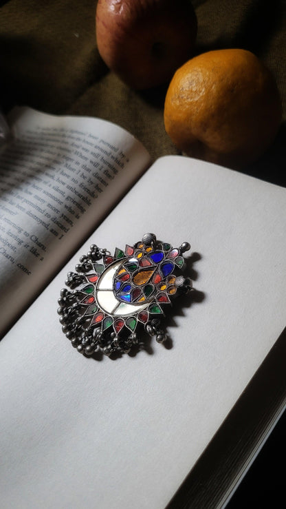 Side view of Surmaya Pendant in pure silver with handcrafted detailing
