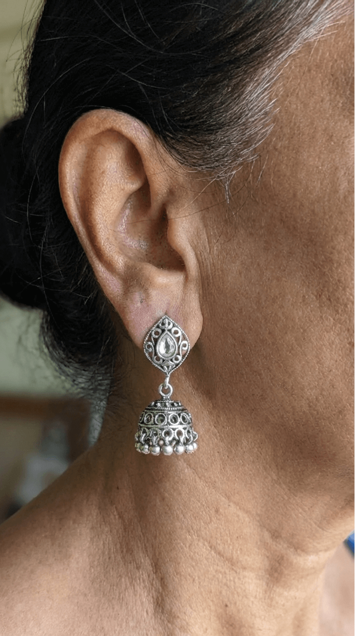 Side view of Sutudri Jhumka in pure silver with handcrafted detailing