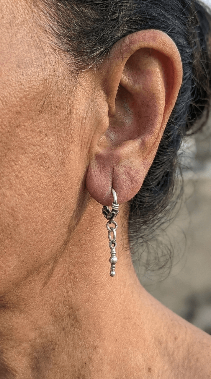 Side view of Swachhand Vintage Hoops in pure silver with vintage detailing
