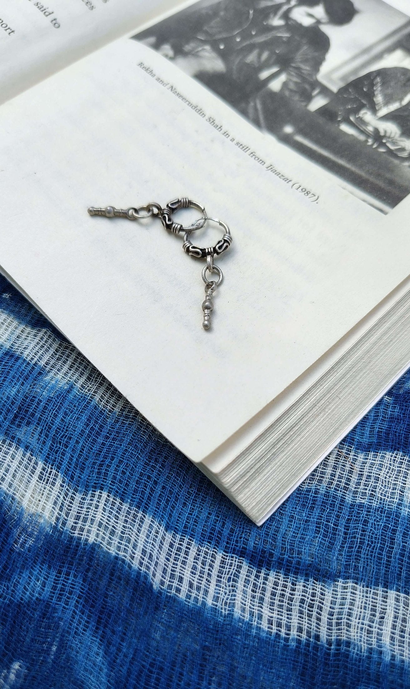 Side view of Swachhand Vintage Hoops in pure silver with vintage detailing