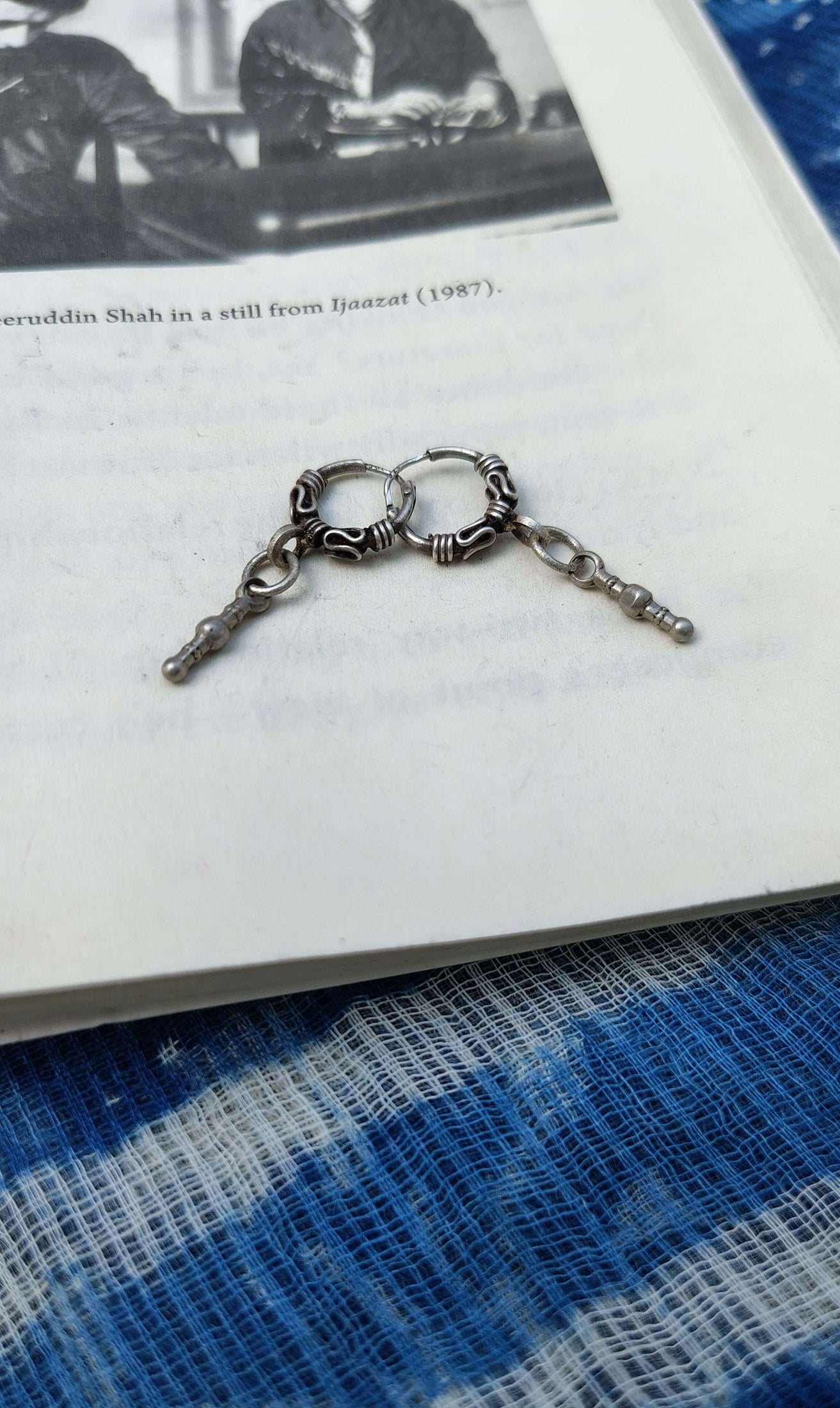 Side view of Swachhand Vintage Hoops in pure silver with vintage detailing