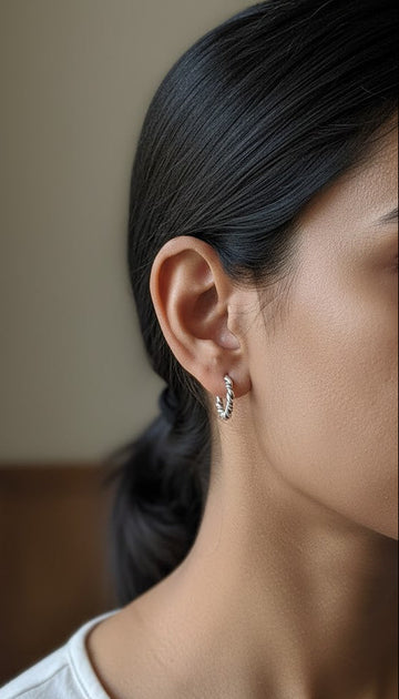 Twisted Sisters Hoops in pure silver with handcrafted detailing