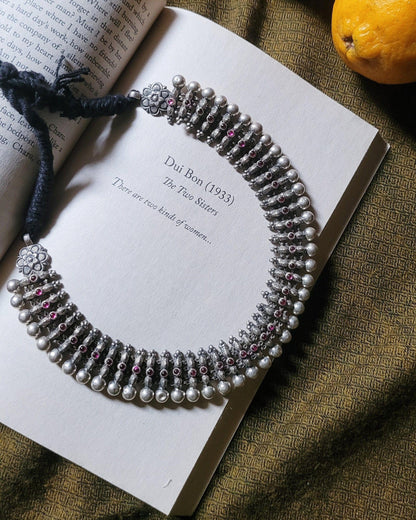 Side view of Urvashi Necklace in pure silver with handcrafted detailing