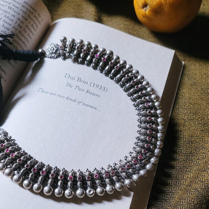 Side view of Urvashi Necklace in pure silver with handcrafted detailing
