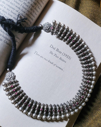 Side view of Urvashi Necklace in pure silver with handcrafted detailing
