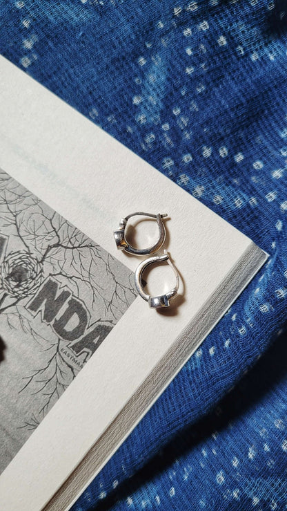 Side view of Valentina Hoops in pure silver with handcrafted detailing