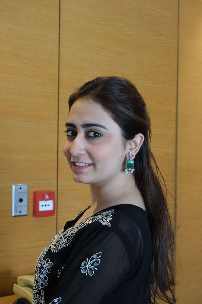 Side view of Vasant Earrings in pure silver with handcrafted detailing