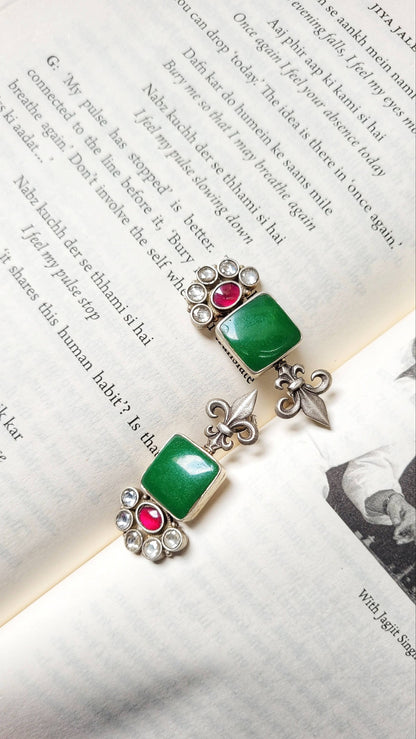 Side view of Vasant Earrings in pure silver with handcrafted detailing