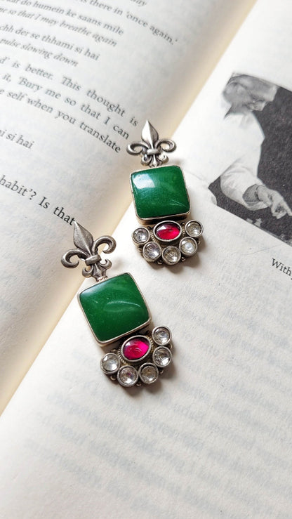 Side view of Vasant Earrings in pure silver with handcrafted detailing