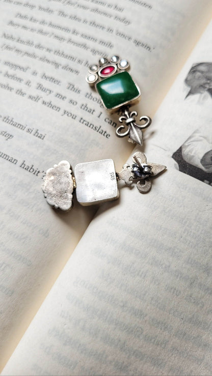 Side view of Vasant Earrings in pure silver with handcrafted detailing