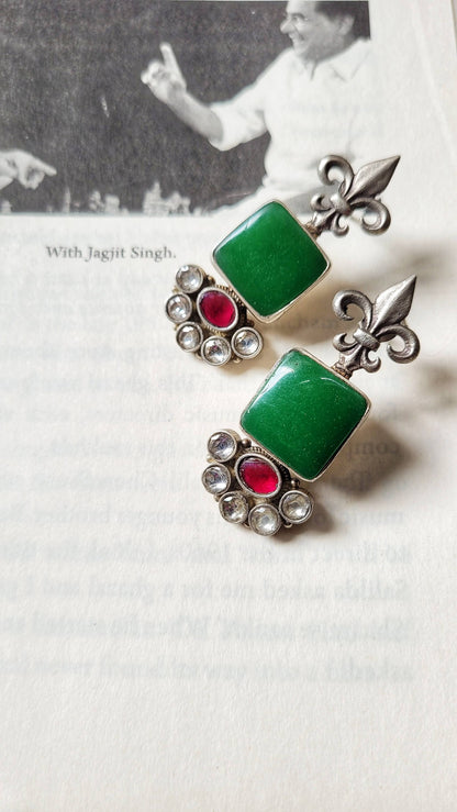 Side view of Vasant Earrings in pure silver with handcrafted detailing