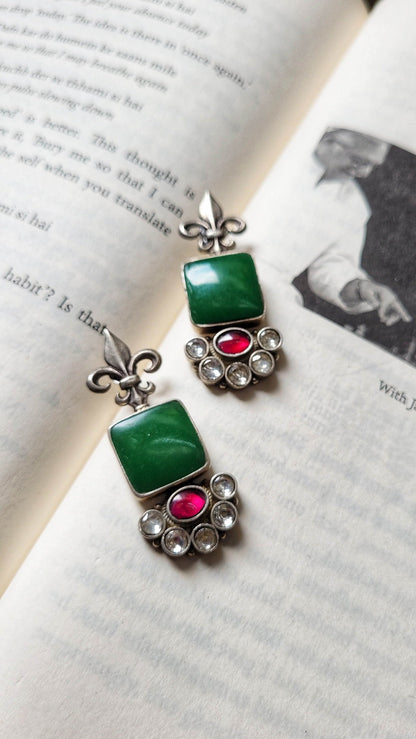Side view of Vasant Earrings in pure silver with handcrafted detailing