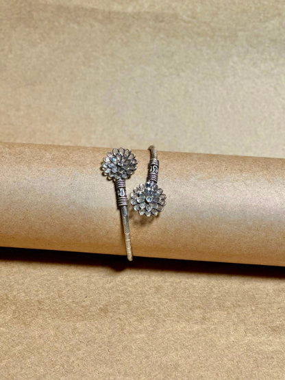 Side view of Victoria Kada in pure silver with handcrafted detailing