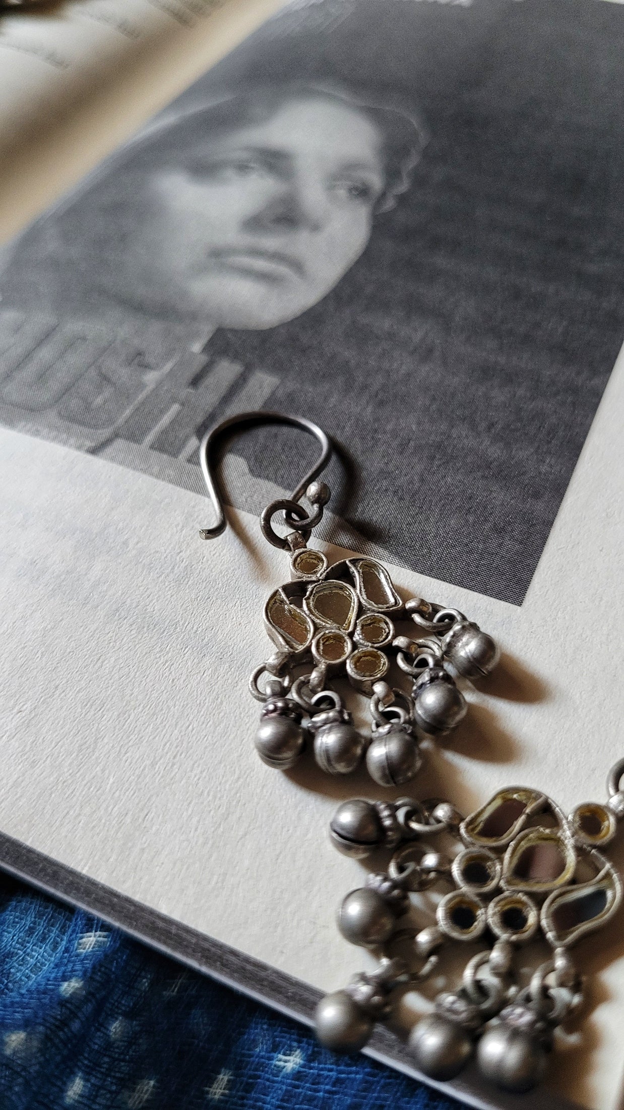 Side view of Waheeda Earrings in pure silver with handcrafted detailing