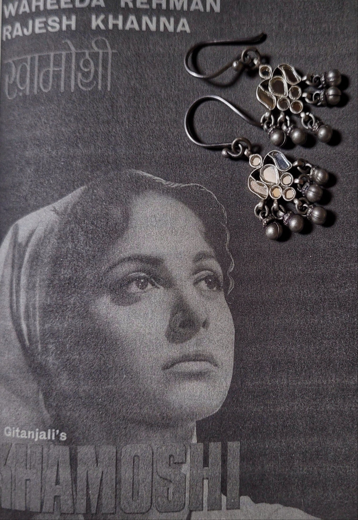 Side view of Waheeda Earrings in pure silver with handcrafted detailing