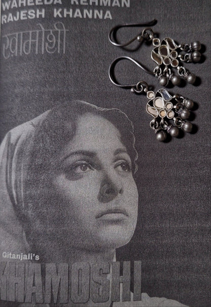 Side view of Waheeda Earrings in pure silver with handcrafted detailing