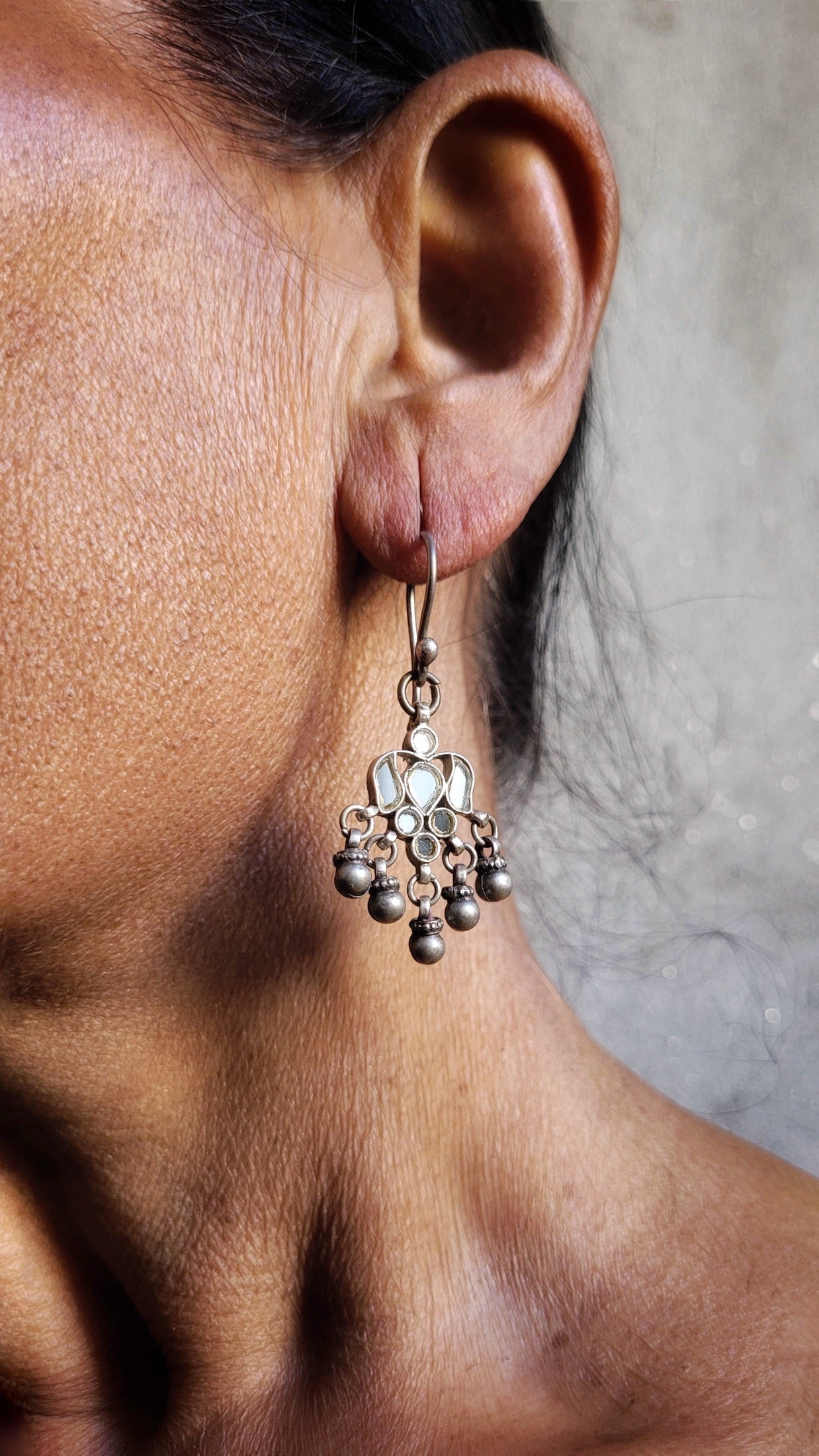 Side view of Waheeda Earrings in pure silver with handcrafted detailing