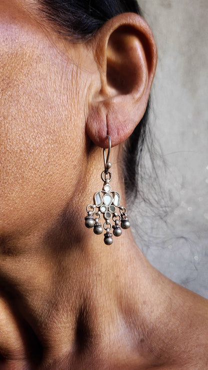 Side view of Waheeda Earrings in pure silver with handcrafted detailing
