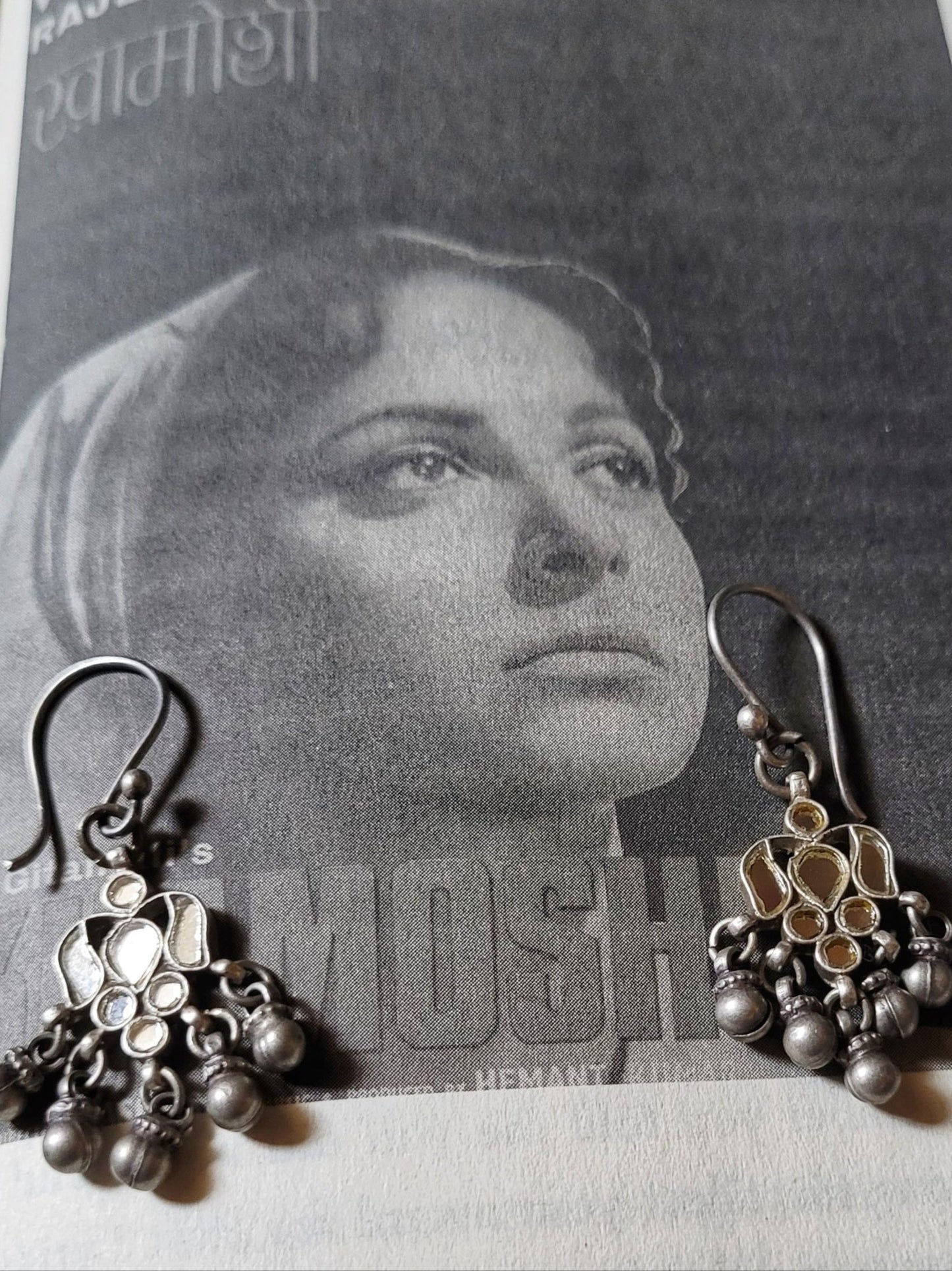 Side view of Waheeda Earrings in pure silver with handcrafted detailing
