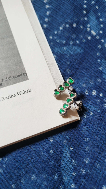 Side view of Yaarana Studs in pure silver with handcrafted detailing