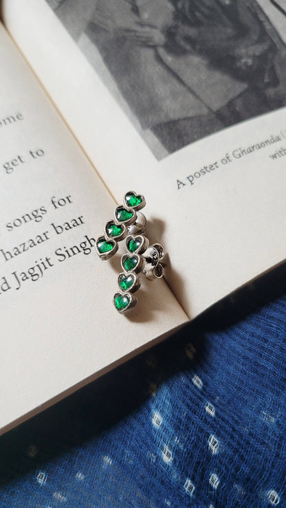 Side view of Yaarana Studs in pure silver with handcrafted detailing
