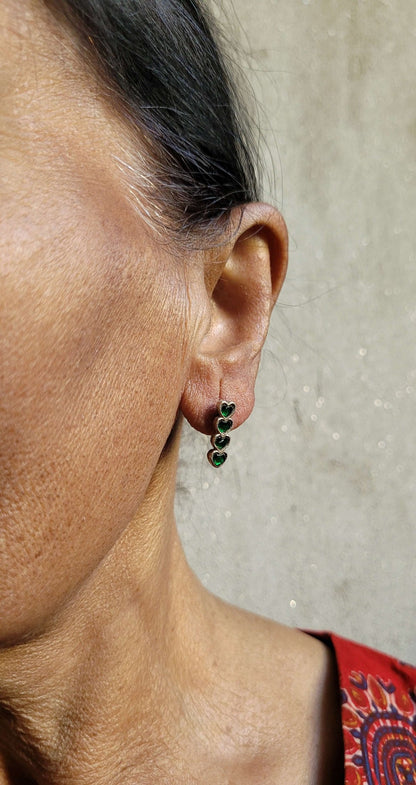 Side view of Yaarana Studs in pure silver with handcrafted detailing