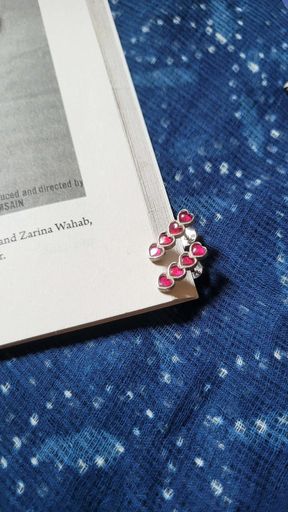 Side view of Yaarana Studs in pure silver with handcrafted detailing